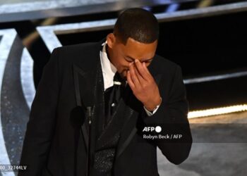 US actor Will Smith accepts the award for Best Actor in a Leading Role for "King Richard" onstage during the 94th Oscars at the Dolby Theatre in Hollywood, California on March 27, 2022. (Photo by Robyn Beck / AFP)