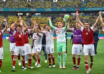 PEMAIN Austria meraikan kemenangan menewaskan Ukraine dalam aksi terakhir kedua-dua pasukan itu dalam saingan Kumpulan C di Stadium Bucharest. - AFP