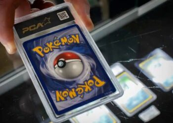 VINATH Oudomsine menggunakan AS$57,789 daripada pinjaman Covid-19 untuk beli kad Pokemon. - ROMUALD MEIGNEUX