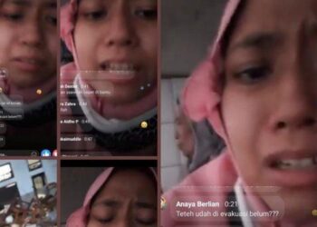 TANGKAP layar Facebook Yulianti Safitri merakam video yang meminta bantuan pasukan penyelamat memindahkannya dan keluarga ke tempat selamat selepas terkandas dalam banjir. - TRIBUNNEWS