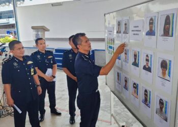 MOHD. SHUHAILY MOHD. ZAIN dalam sidang akhbar berkenaan kejayaan polis menumpaskan beberapa sindiket jenayah di IPK Pulau Pinang, George Town hari ini.