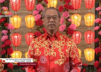 MUHYIDDIN Yassin menyampaikan perutusan sempena Majlis Rumah Terbuka Tahun Baharu Cina secara maya, malam ini.