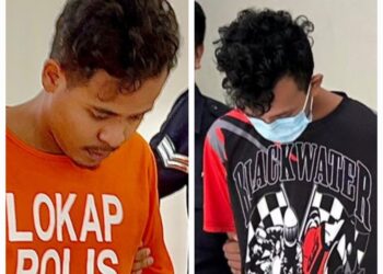 FAKHRUL AMIN MOHD. NOR (kanan) dan Muhammad Asri Ahmad Daud, masing-masing didakwa di Mahkamah Sesyen Muar melakukan amang seksual terhadap dua pelajar.