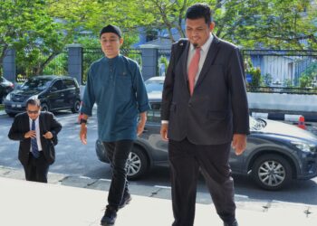 PU Azman hadir pada prosiding hari kedua kes perbicaraan kes amang seksual di Mahkamah Sesyen Seremban hari ini.-UTUSAN/MOHD. SHAHJEHAN MAAMIN.