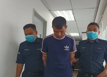 MUHAMMAD Akhtar Ramzan didakwa di Mahkamah Majistret Ipoh hari ini atas pertuduhan mencabul kehormatan wanita warga Perancis, Isnin lalu. - UTUSAN