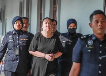 TAN I-Lyn hadir di Mahkamah Sesyen Kuala Lumpur bagi menghadapi dua pertuduhan pecah amanah wang RM1.58 juta milik sebuah firma perunding pertahanan. -   UTUSAN/ISKANDAR ISHAK