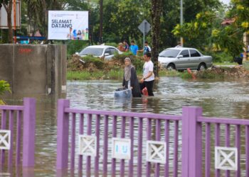 KAWASAN Bandar Baru Lubok Jong, Rantau Panjang, Kelantan yang ditenggelami banjir semalam-UTUSAN/KAMARUL BISMI KAMARUZAMAN.