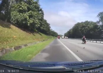 KEADAAN kemalangan motosikal berkuasa tinggi melibatkan pasangan suami isteri yang melanggar lori di Kilometer 363.8, Lebuh Raya Utara-Selatan arah utara dekat Sungkai hari ini. - UTUSAN/FOTO MEDIA SOSIAL