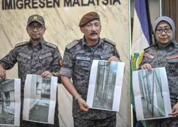 RUSLIN Jusoh menunjukkan pintu sel dan pagar yang rosak akibat rusuhan tahanan PATI di Depot Tahanan Imigresen, Bidor, Perak. - UTUSAN/FAIZ ALIF ZUBIR