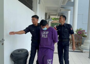 MUHAMMAD Rozali Rahim dituduh di Mahkamah Sepang, Selangor.