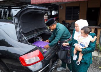 BIARPUN memakan masa, tetapi masih ramai memilih memandu sendiri, kerana serasi dengan keperluan seisi keluarga. - UTUSAN/SADDAM YUSOF