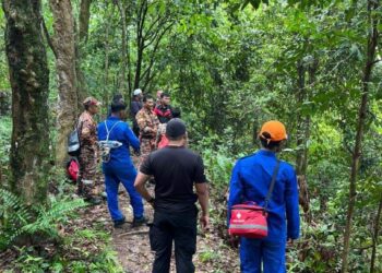 Operasi mencari mangsa hilang di Bukit Hilltop, Batu Kawan sedang giat dijalankan. Foto IHSAN APM