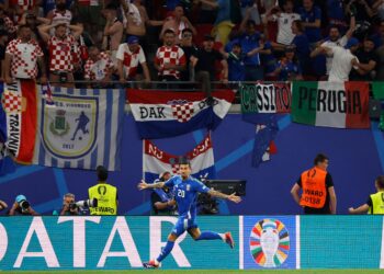 PENYERANG Itali, Mattia Zaccagni meraikan kejayaannya menjaringkan gol penyamaan untuk mengikat Croatia 1-1 dalam aksi terakhir Kumpulan B Kejohanan Eropah (Euro) 2024. - AFP