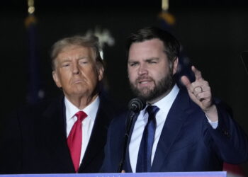 VANDALIA, OHIO - NOVEMBER 07: Former U.S. President Donald Trump and Republican candidate for U.S. Senate JD Vance greet supporters during the rally at the Dayton International Airport on November 7, 2022 in Vandalia, Ohio. Trump campaigned at the rally for Ohio Republican candidates including Republican candidate for U.S. Senate JD Vance, who is running in a tight race against Democratic candidate for U.S. Senate Rep. Tim Ryan (D-OH).   Drew Angerer/Getty Images/AFP (Photo by Drew Angerer / GETTY IMAGES NORTH AMERICA /  AFP)