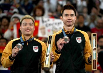 PEMENANG pingat gangsa Sukan Olimpik Paris 2024, Aaron Chia dan Soh Wooi Yik kekal bersama Persatuan Badminton Malaysia (BAM) hingga 2028. - AFP