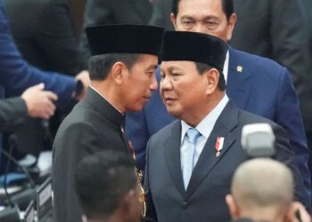 - JOKOWI akan menyerahkan tugas Presiden Indonesia kepada Prabowo Subianto.-AFP