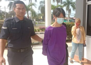 FO Siew How ketika dibawa ke Mahkamah Majistret Seri Manjung di Lumut hari ini. - UTUSAN