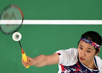 An Se-young meraikan kejayaan menang pingat emas dalam acara badminton perseorangan wanita di Olimpik Paris.-AFP