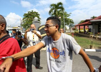 MOHD. Shah Rizal Yang didakwa sengaja menyebabkan cedera menggunakan pisau ke atas pemilik rumah yang disewanya ketika dituduh di Mahkamah Majistret Sungai Siput hari ini. - UTUSAN/MUHAMAD NAZREEN SYAH MUSTHAFA