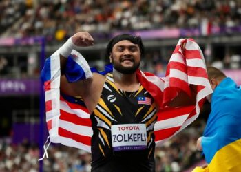 MUHAMMAD Ziyad Zolkefli meraih pingat perak menerusi acara akhir lontar peluru lelaki F20 (kecacatan intelektual) Sukan Paralimpik Paris 2024 di Stade de France, semalam. - IHSAN MSN