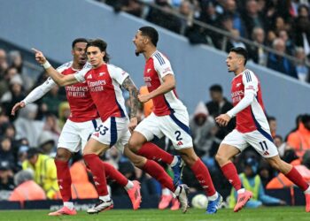 PEMAIN Arsenal meraikan jaringan ketika berdepan City- AFP