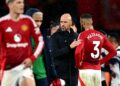 ERIK Ten Hag menenangkan pemain-pemainya selepas mereka tewas kepada Tottenham pada aksi Liga Perdana Inggeris di Old Trafford semalam.-AFP