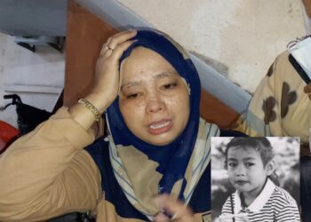 NORIZAN Ujak tidak mampu menahan sebak selepas kehilangan dua anaknya, Muhammad Amirul Hazlin dan Nur Afiqah Sofea Hazlin (gambar kecil) ketika ditemui di Jabatan Forensik Hospital Melaka.