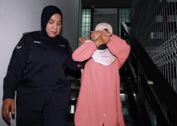 ROSNAH Mat Zain didakwa memalsukan dokumen bagi pembelian piano digital bernilai RM10,200, tiga tahun lalu dituduh di Mahkamah Sesyen Ipoh hari ini. - UTUSAN