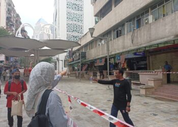 KEADAAN di sekitar kawasan Jalan Masjid India yang lengang akibat kejadian tanah jerlus lalu, di sini tengah hari ini.