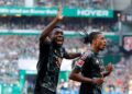 PEMAIN Bayern Munich, Michael Olise (kanan) meraikan kejayaannya menjaringkan gol bersama Alphonso Davies ketika membelasah Werder Bremen 5-0 dalam aksi liga di tempat lawan, semalam. - AFP