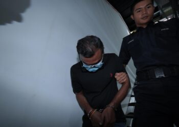 N. NARENDRAN mengaku tidak bersalah di Mahkamah Majistret Ipoh hari ini atas lima pertuduhan penipuan membabitkan pelaburan bernilai RM58,000. - UTUSAN