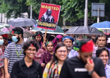 PENUNJUK perasaan mengambil bahagian dalam protes bagi menuntut keadilan terhadap mangsa yang ditangkap dan dibunuh dalam keganasan di Dhaka, pada 2 Ogos lepas.- AFP