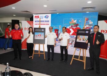 FAHMI Fadzil ketika Sambutan Hari Pos Sedunia di Kompleks Dayabumi, Kuala Lumpur semalam.