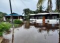 DUA buah rumah di Jalan Kampung Parit Panjang, Ayer Baloi, Pontian dilanda banjir susulan hujan lebat sejak awal pagi.