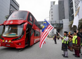 MOHD. Na'im Mokhtar ketika melancarkan Pelepasan Jelajah Peduli Ummah: Sejahtera Insan Al-Falah anjuran Mapim di Putrajaya. - UTUSAN/FAISOL MUSTAFA