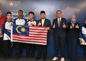 SHAHRIN (enam dari kiri) dan Ketua Penyelaras F1 In Schools Malaysia, Mohd.Nazrin Zulkifli (empat dari kanan) bergambar bersama wakil F1 In Schools selepas selesai menandatangani MOU antara kedua-dua  pihak.