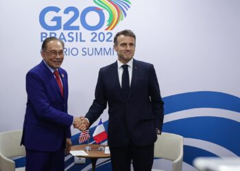 ANWAR Ibrahim bersama Presiden Perancis, Emmanuel Macron di Sidang Kemuncak G20 di Rio de Janeiro Brazil.