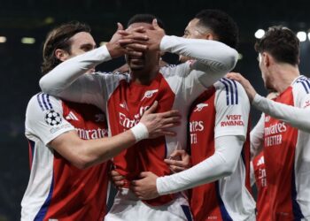 PEMAIN pertahanan Arsenal, Gabriel Magalhaes (dua dari kiri) meraikan jaringan gol bersama rakan sepasukan dalam aksi Liga Juara-Juara menentang Sporting Lisbon di Stadium Jose Alvalade, Lisbon, pagi ini. - AFP