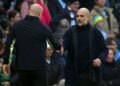 JURULATIH Manchester City, Pep Guardiola (kanan) bersalaman bersama rakan sejawatnya, Sean Dyche dari Everton selepas tamat perlawanan di Stadium Etihad, hari ini. - AFP