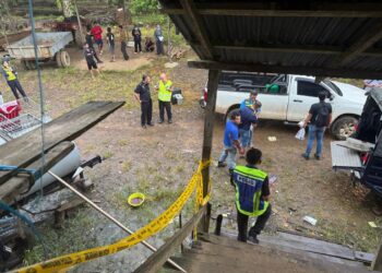 LOKASI mangsa maut akibat ditetak di sebuah rumah kebun di Jalan Sing Ho, Merotai Besar, Tawau semalam.