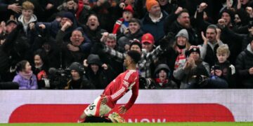 Pemain Manchester United, Amad Diallo meraikan jaringan gol menentang Southampton dalam aksi Liga Perdana Inggeris di Old Trafford hari ini. - AFP