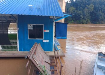 KAWASAN rumah rakit ketika mangsa tergelincir dan jatuh ke dalam Sungai Pahang berdekatan Jerantut Feri, Jerantut, Pahang. - IHSAN JBPM PAHANG