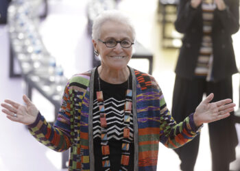 FILE - Rosita Missoni poses for photographers before the Missoni women's Spring/Summer 2018/19 fashion collection, presented in Milan, Italy, Sept. 23, 2017. (AP Photo/Luca Bruno, File)