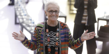 FILE - Rosita Missoni poses for photographers before the Missoni women's Spring/Summer 2018/19 fashion collection, presented in Milan, Italy, Sept. 23, 2017. (AP Photo/Luca Bruno, File)