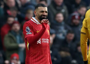 MOHAMED Salah memberi reaksi ketika golnya dibatalkan kerana ofsaid semasa perlawanan bola sepak Liga Perdana Inggeris (EPL) antara Liverpool dan Wolverhampton Wanderers di Anfield, Liverpool, hari ini. - AFP