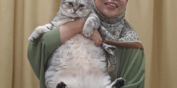 siti Fatimah bersama Luna yang berbadan gempal dengan berat sekitar 10 kilogram,