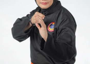 Siti Rahmah Mohamed Nasir komited sebagai jurulatih silat kebangsaan.-UTUSAN/FARIZ RUSADIO