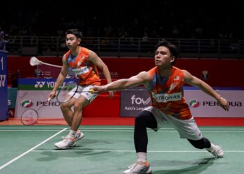 Goh Sze Fei-Nur Izzuddin Rumsani kini menghuni ranking nombor dua dunia. - UTUSAN/SHIDDIEQIIN ZON