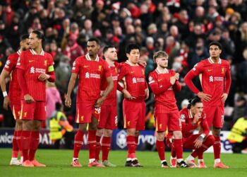 REAKSI kecewa pemain Liverpool selepas tersingkir di pusingan 16 Liga Juara-Juara.-AFP