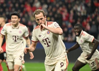 KANE meraikan jaringan ketika berdepan Bayer Leverkusen dalam aksi kedua pusingan Liga Juara-Juara.- AFP